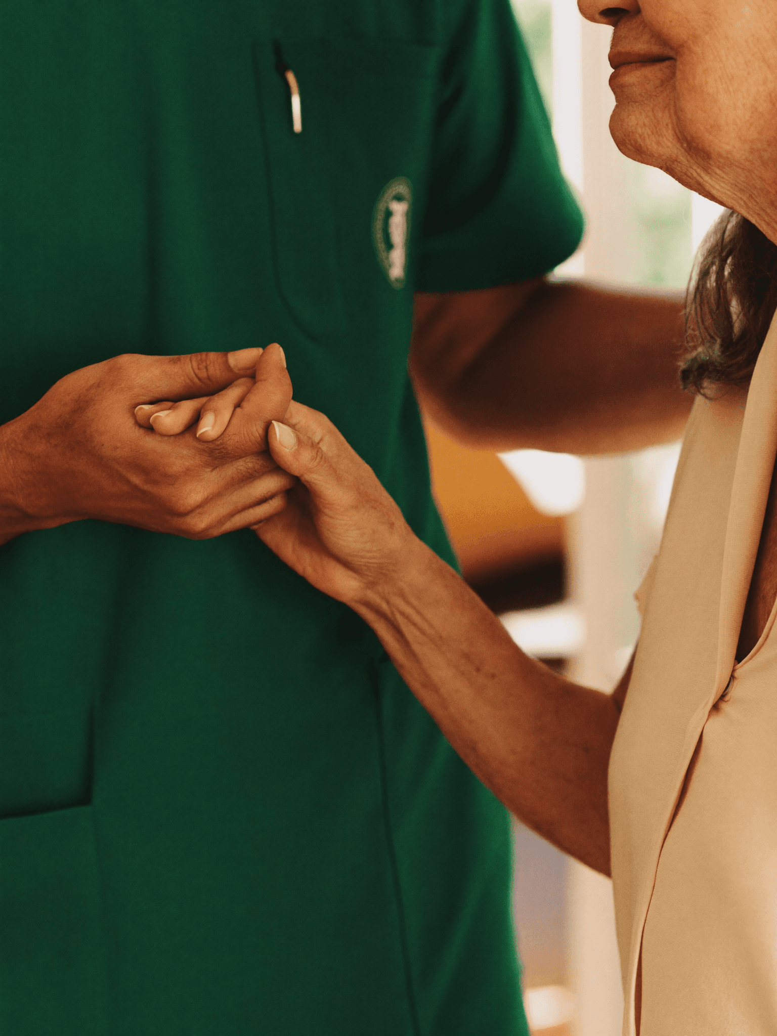 A Circles of Life caregiver sharing a warm moment with a client